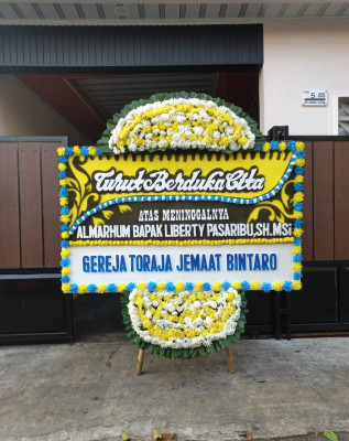 Papan Bunga Duka di Solear